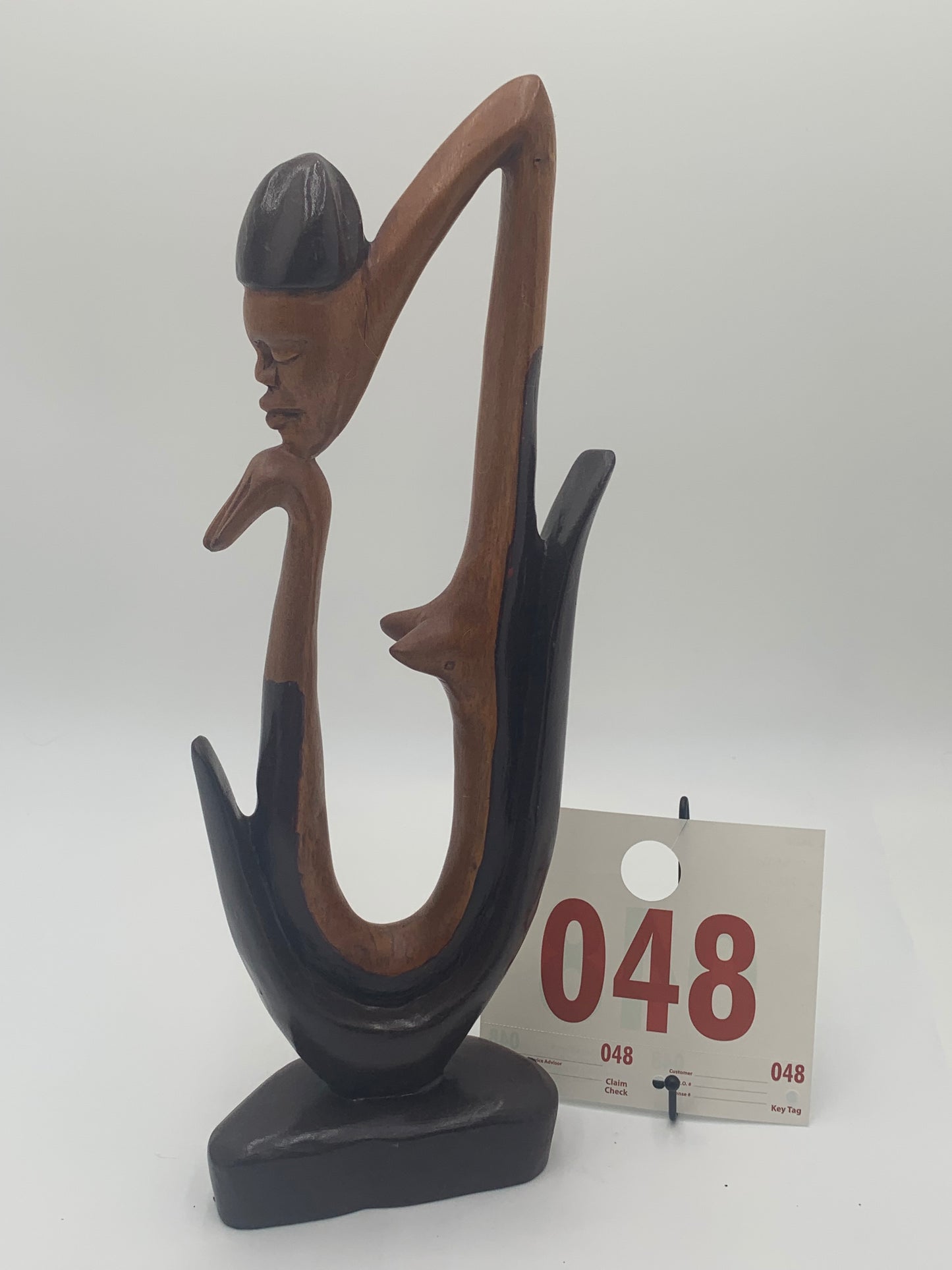 048 - Wooden Statue of Thinking Woman