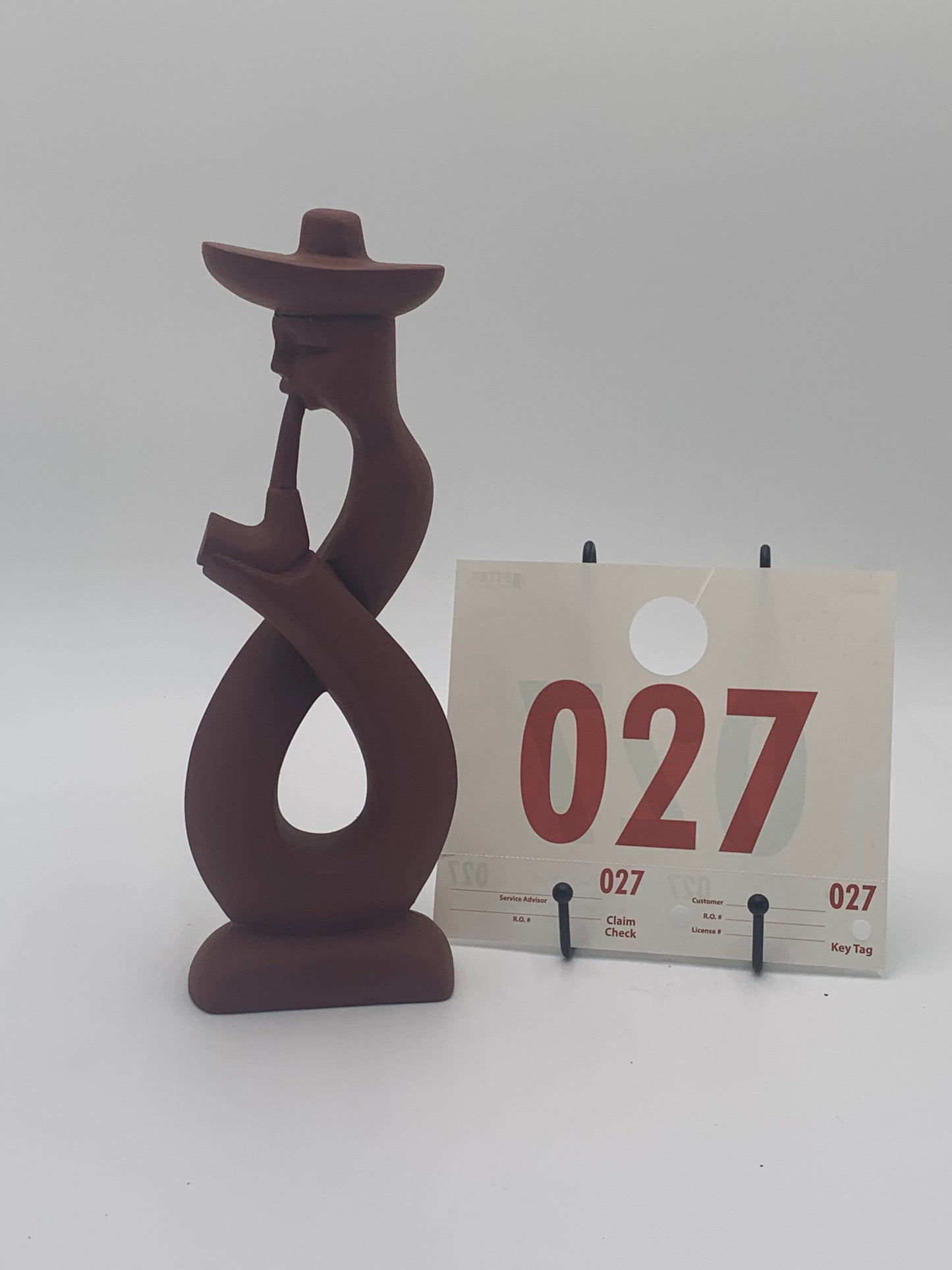 027 - Wooden Statue of Pipe Smoker