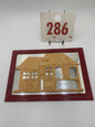 286 - Mirror With Straw Frame And House