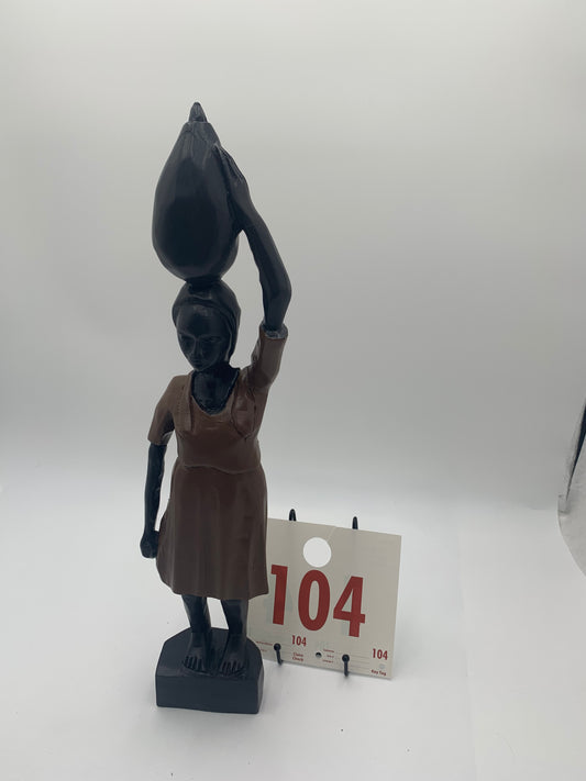 104 - Wooden Statue of a Woman Holding a Basket