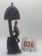 026 - Wooden Statue of Man Climbing Coconut Tree